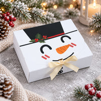 Presentbox med snögubbe och rosett