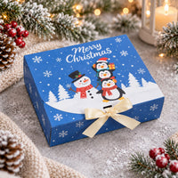 Blå julbox med snögubbe och pingviner